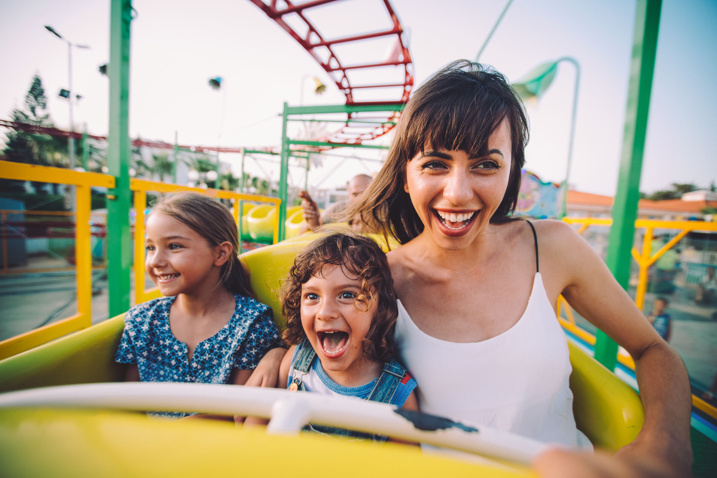 Family riding a roller coaster