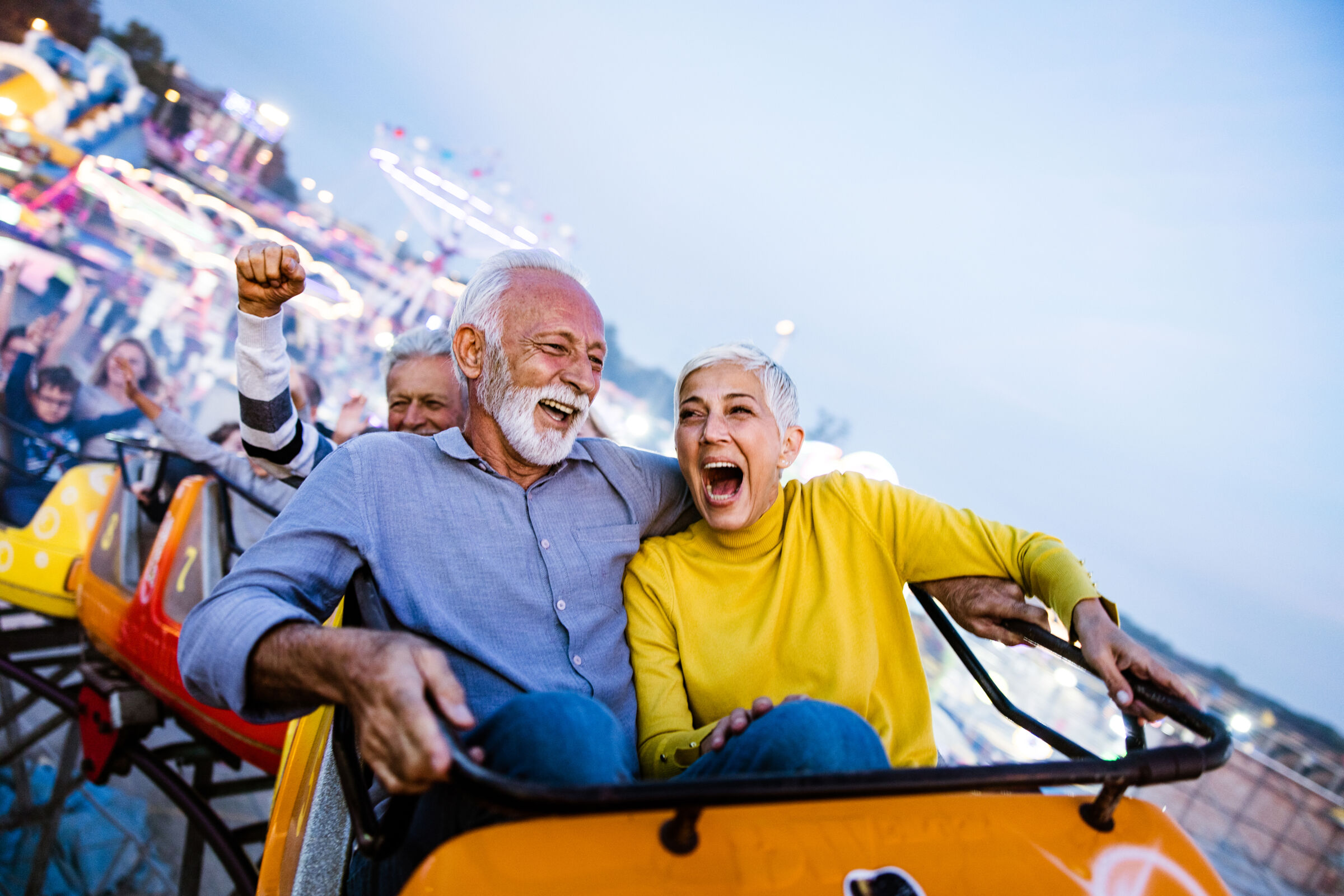Senior couple on roller coaster