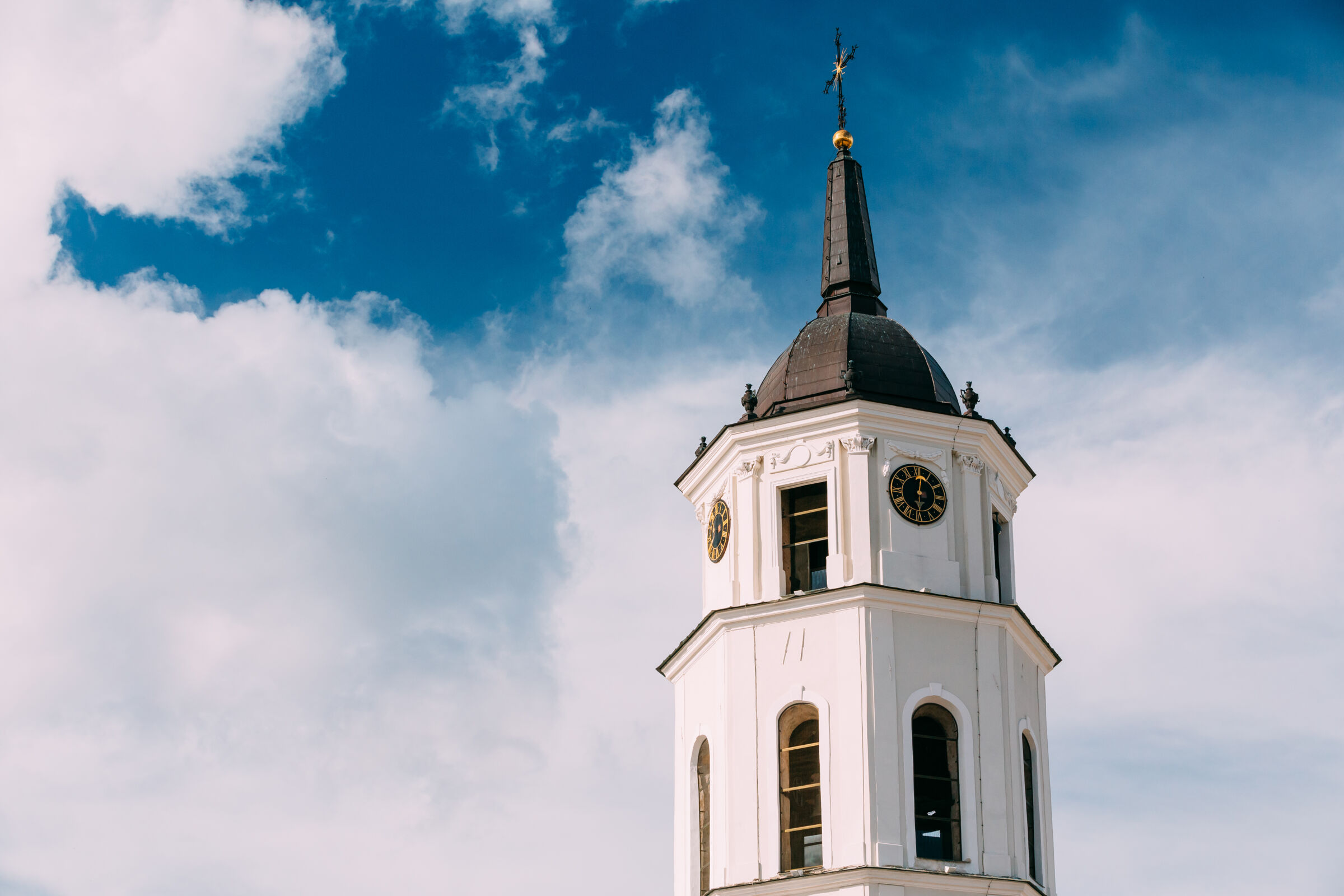 Church steeple against a cloudy sky