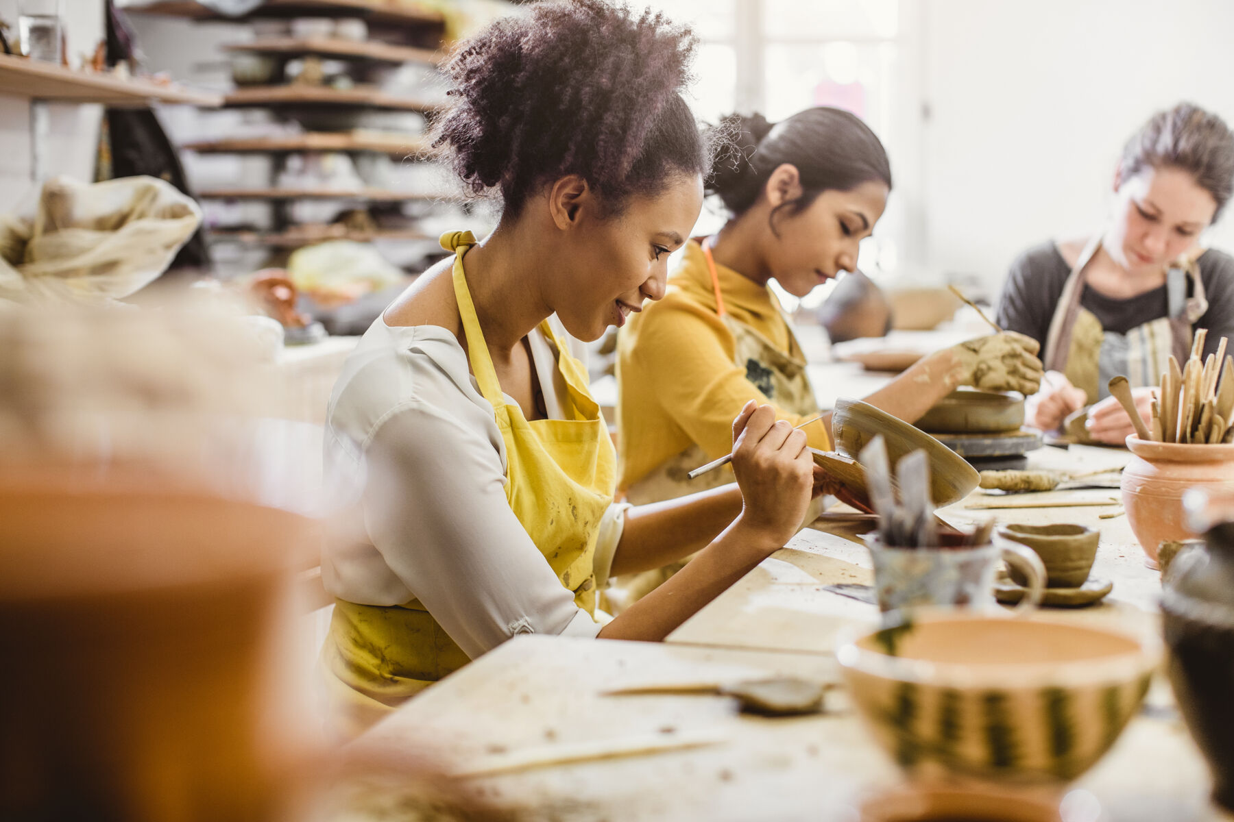 Women painting pottery