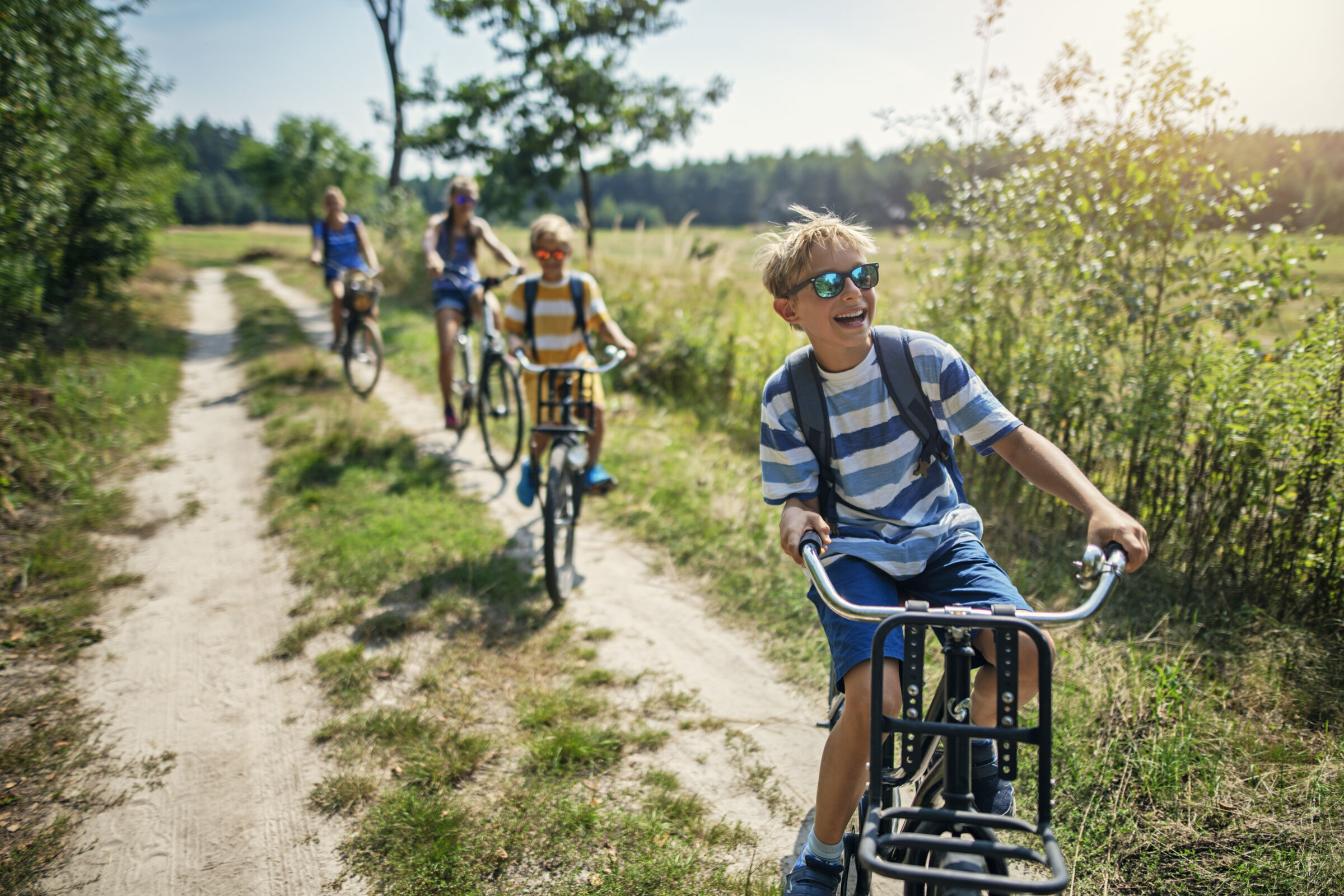 Kids riding bikes in nature