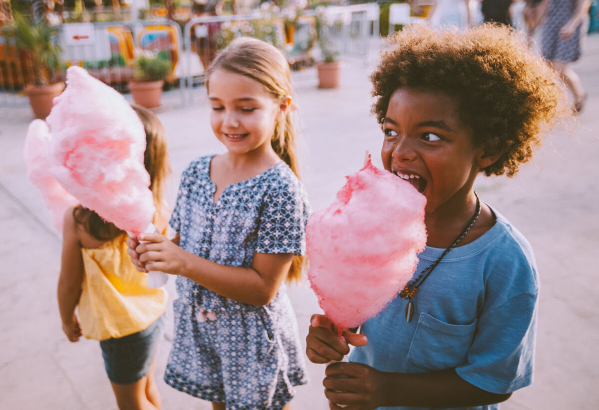 Children eating cotton candy