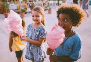 Children eating cotton candy