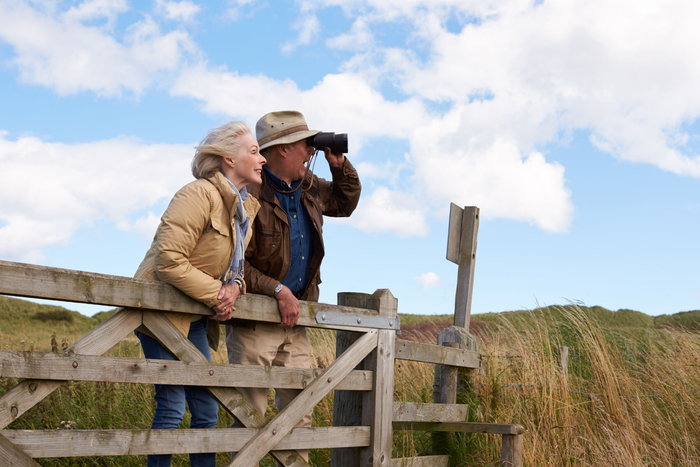 Senior couple bird watching