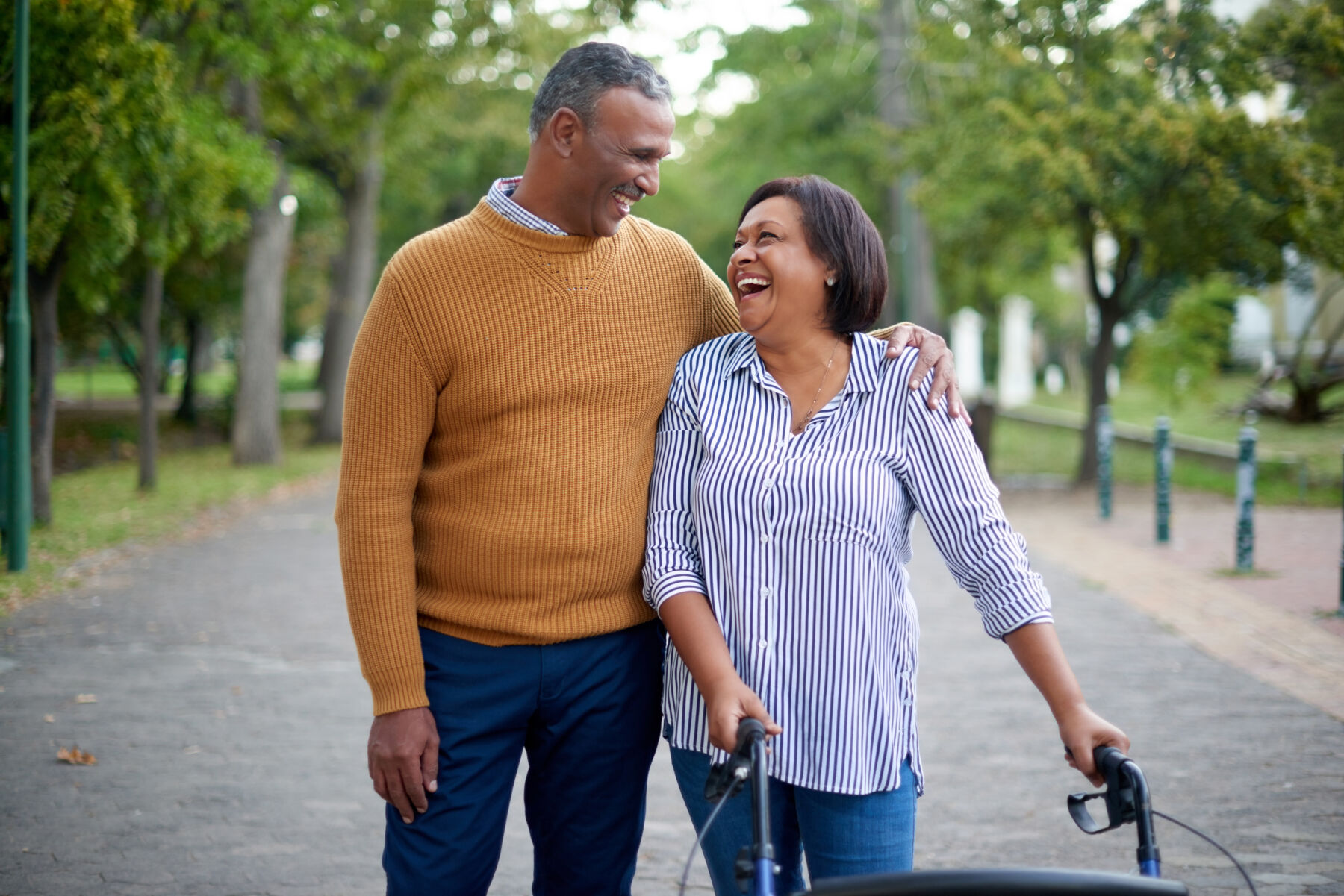 Senior couple walking in a park