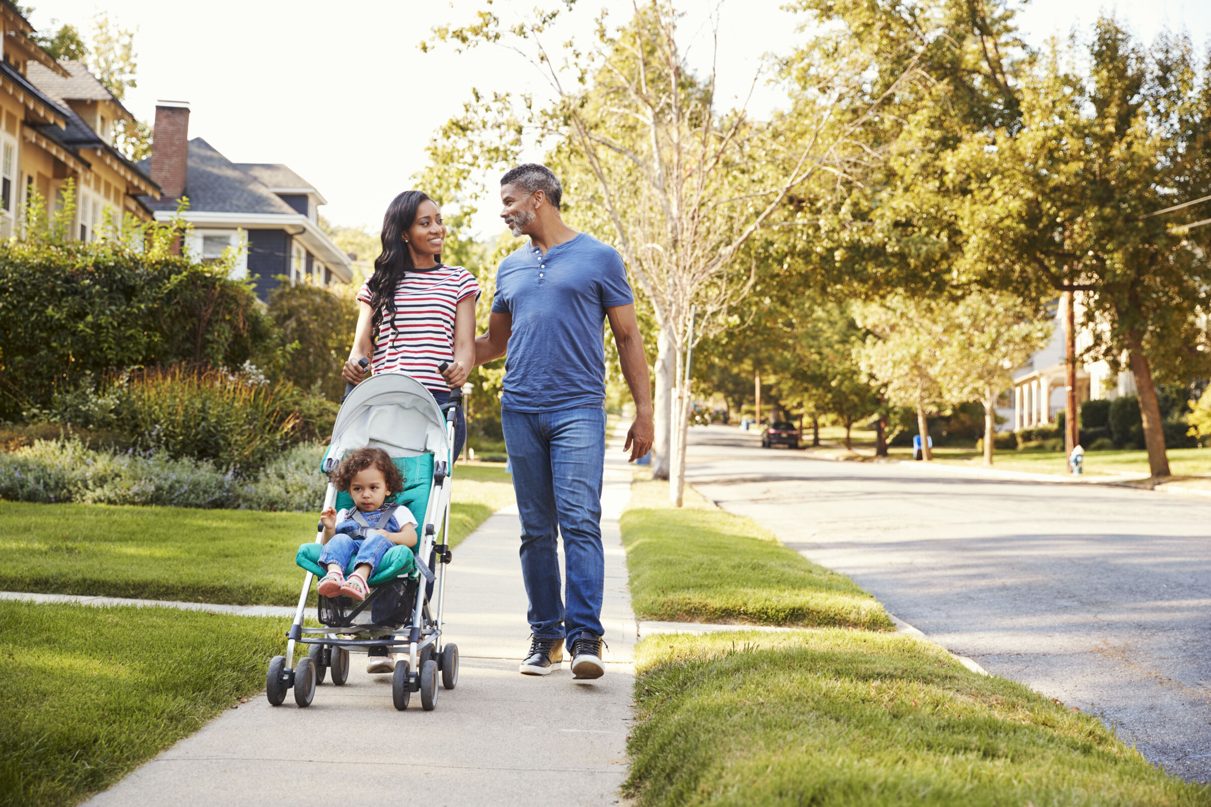 Family walking with a stroller