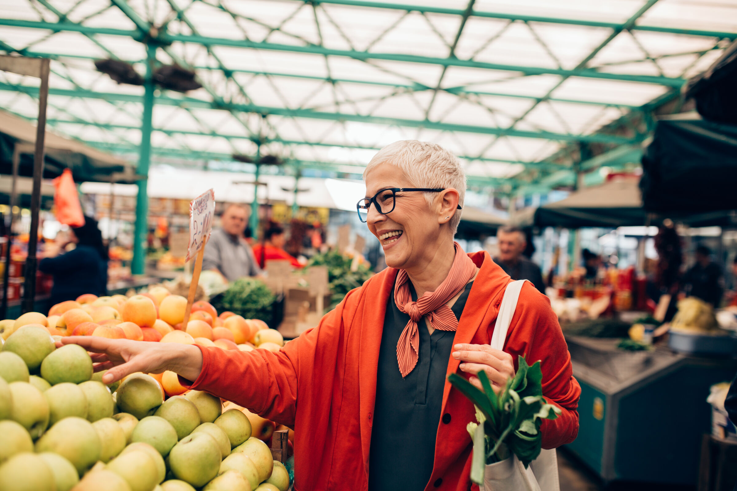Senior woman shopping at a farmer's market