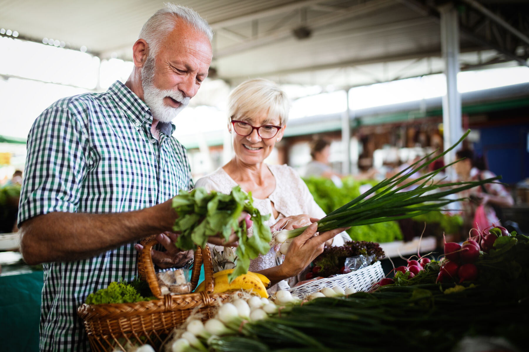 Senior couple shopping at a farmer's market