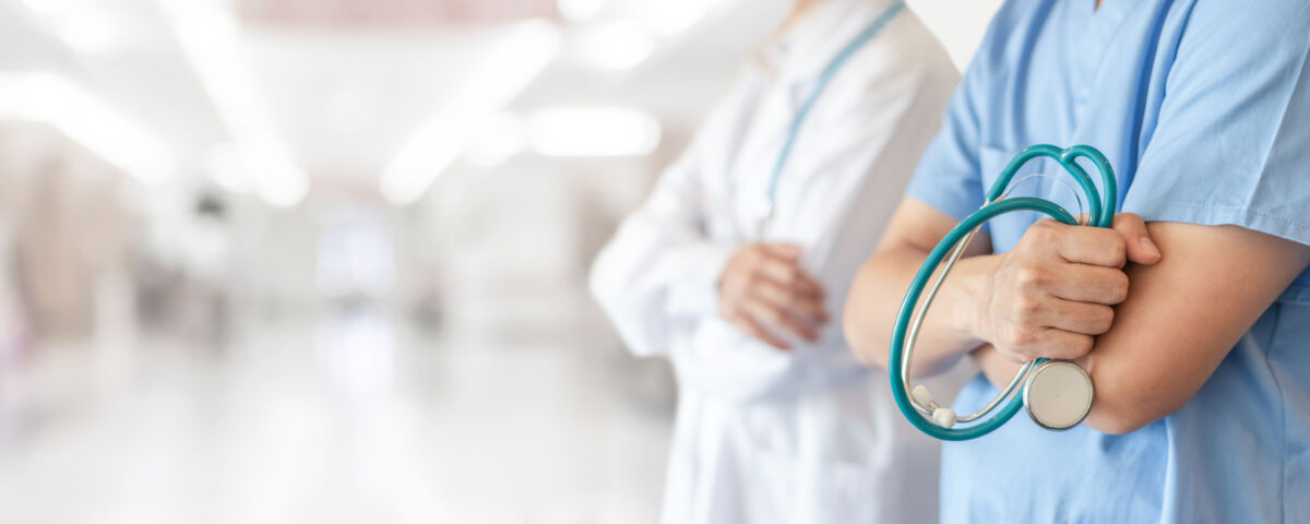 Doctors closeup on arms and stethoscope