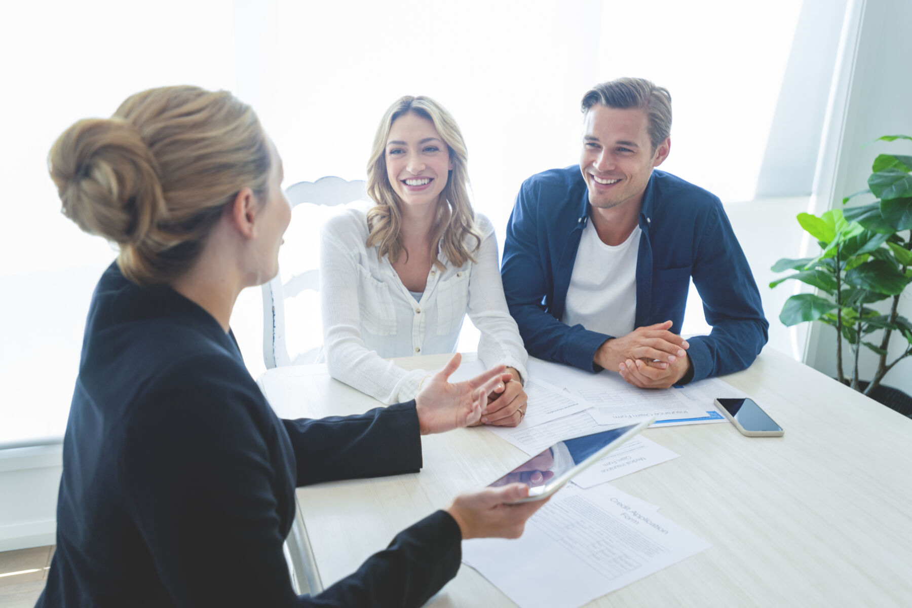 Couple talking with a lender