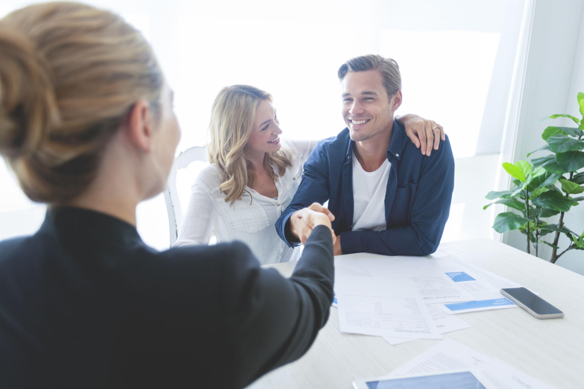 Couple making a deal at an office