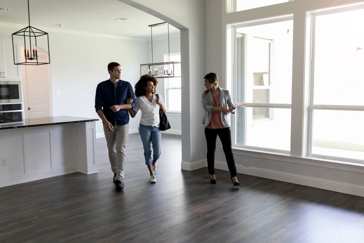 Couple taking a tour of a house