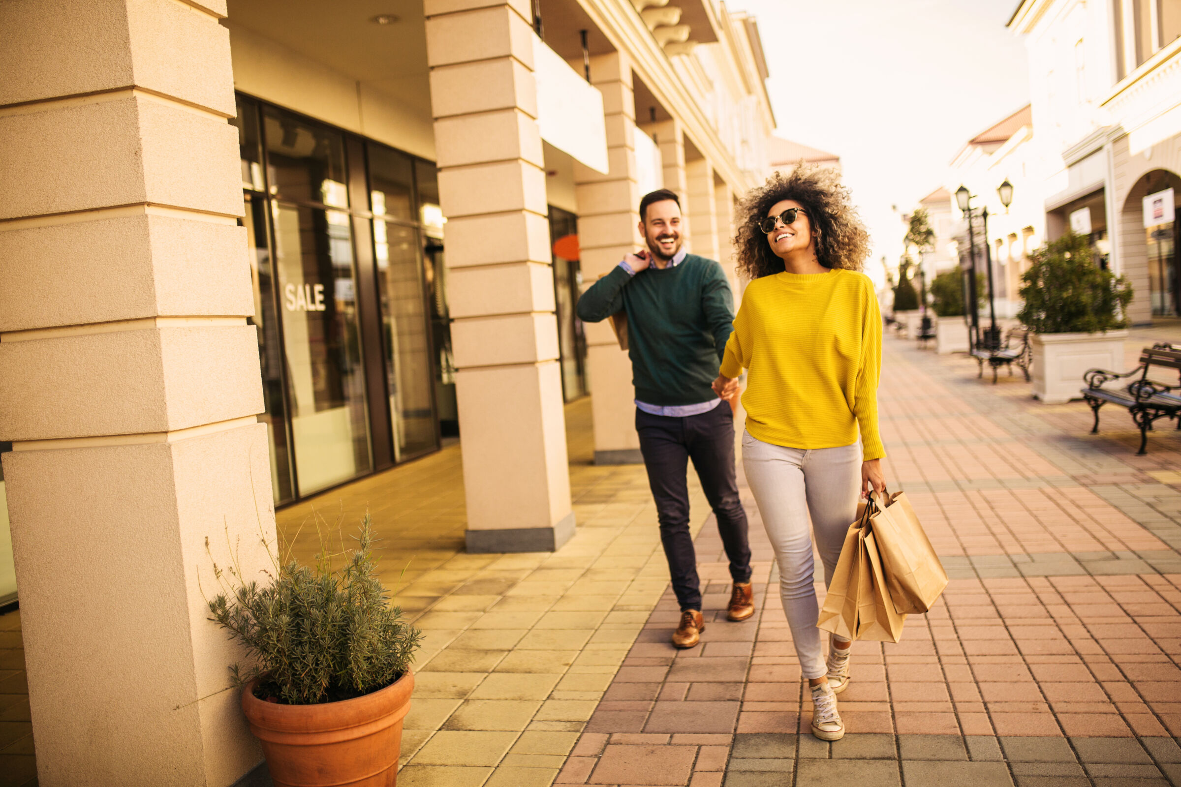 young couple shopping outside