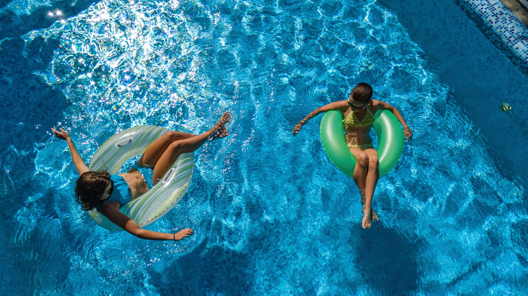 kids floating in the water
