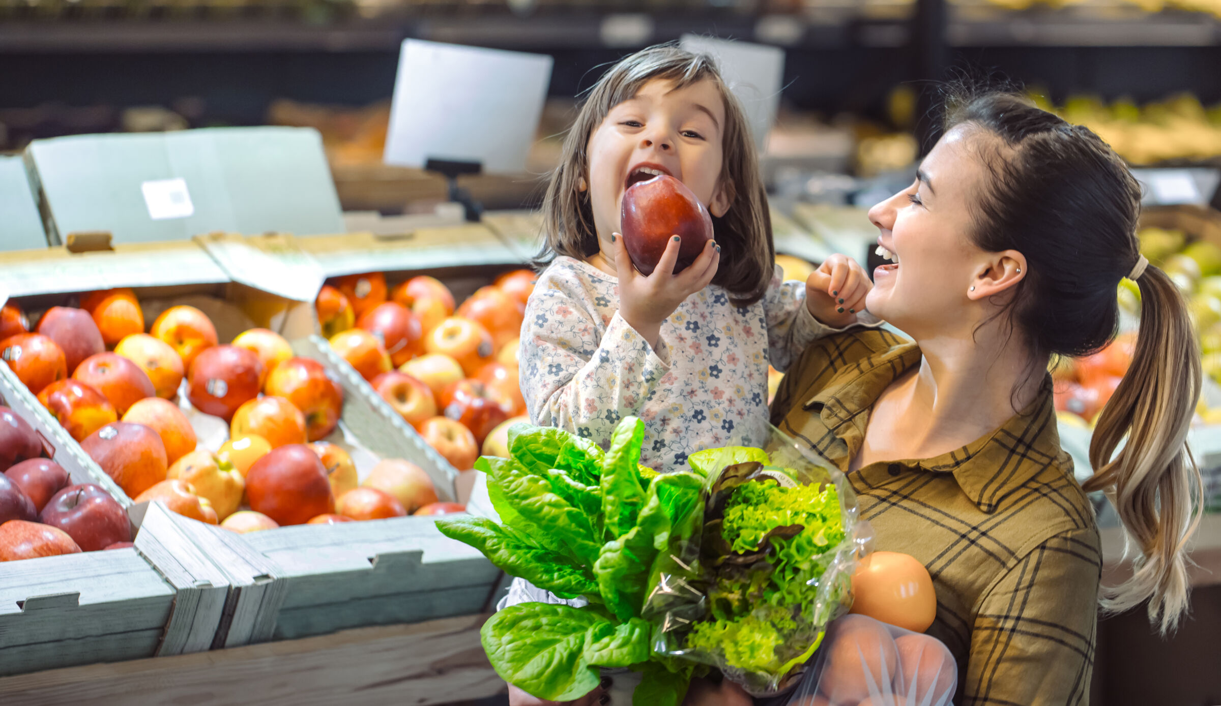 Mother and daughter at the grocery