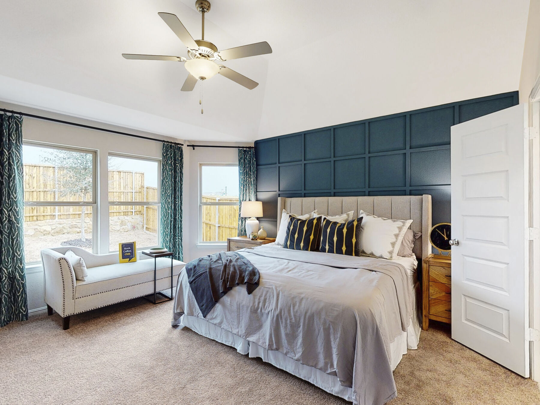 Owner's Bedroom with Teal Accent Wall