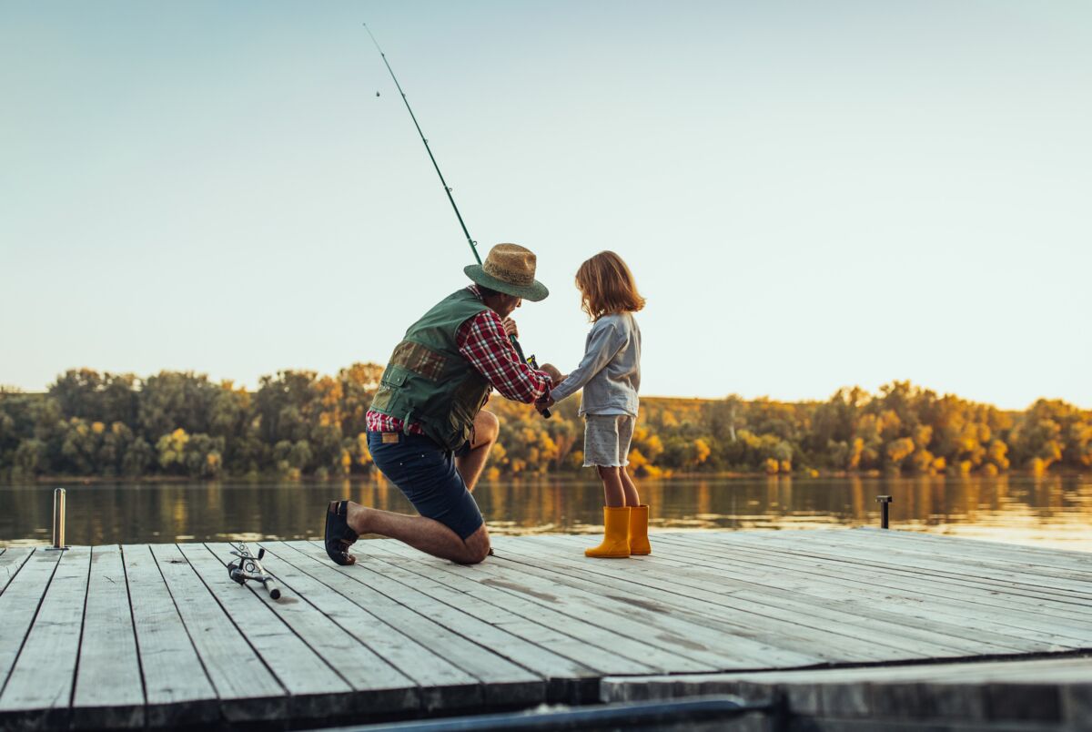 Father Fishing With Daughter