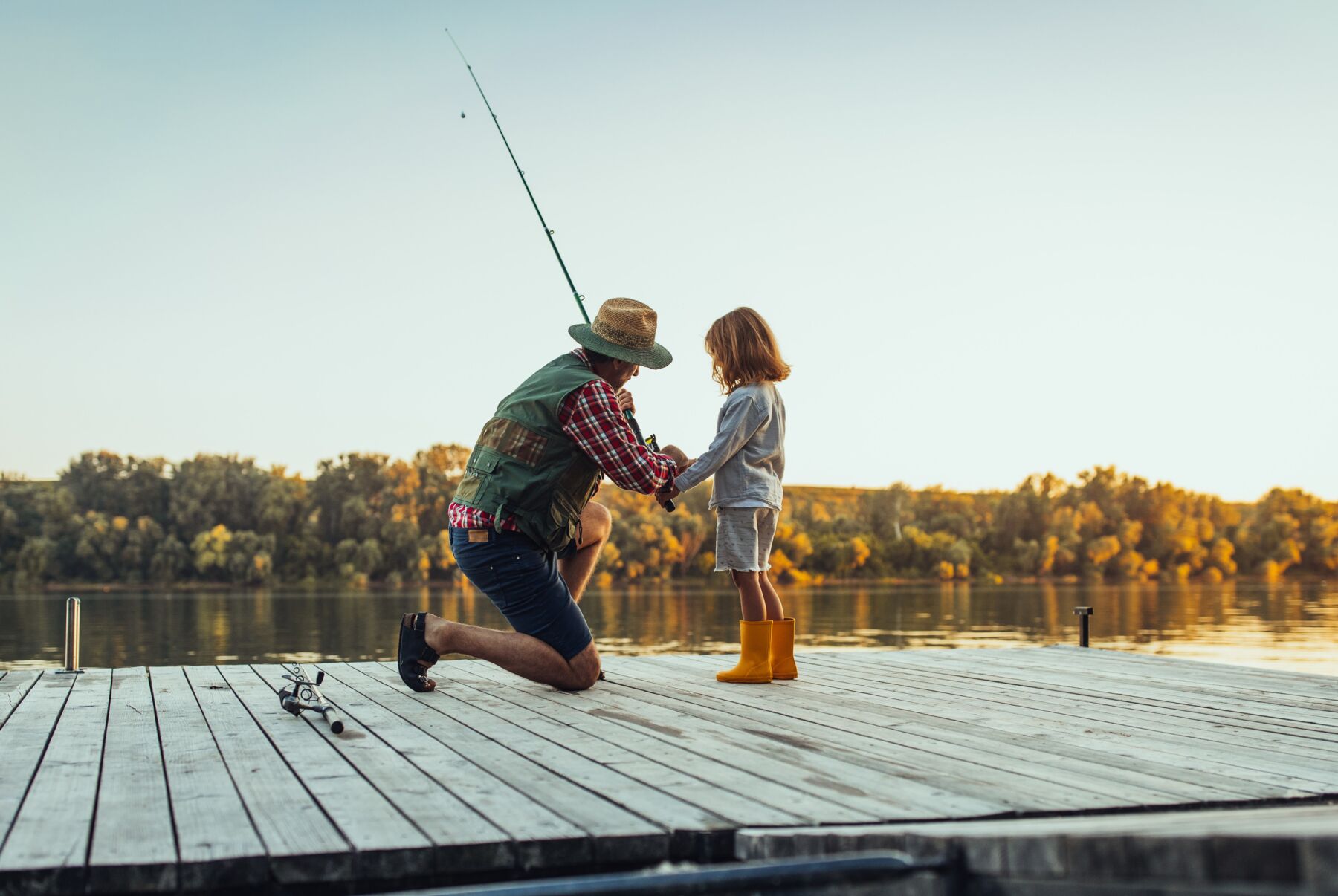 Father Fishing With Daughter