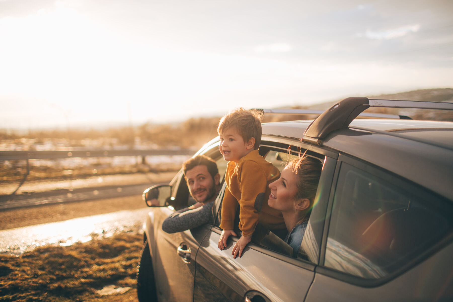 Family in car on the road