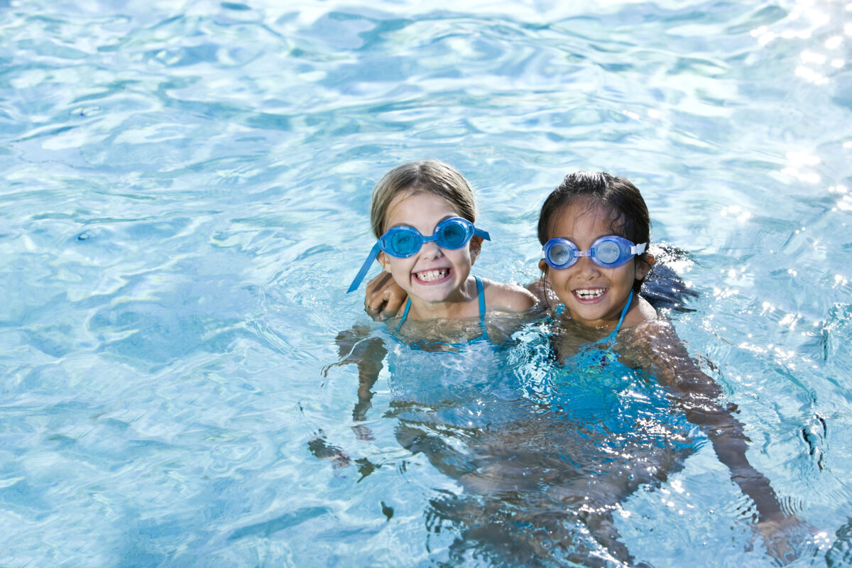 Kids floating in pool