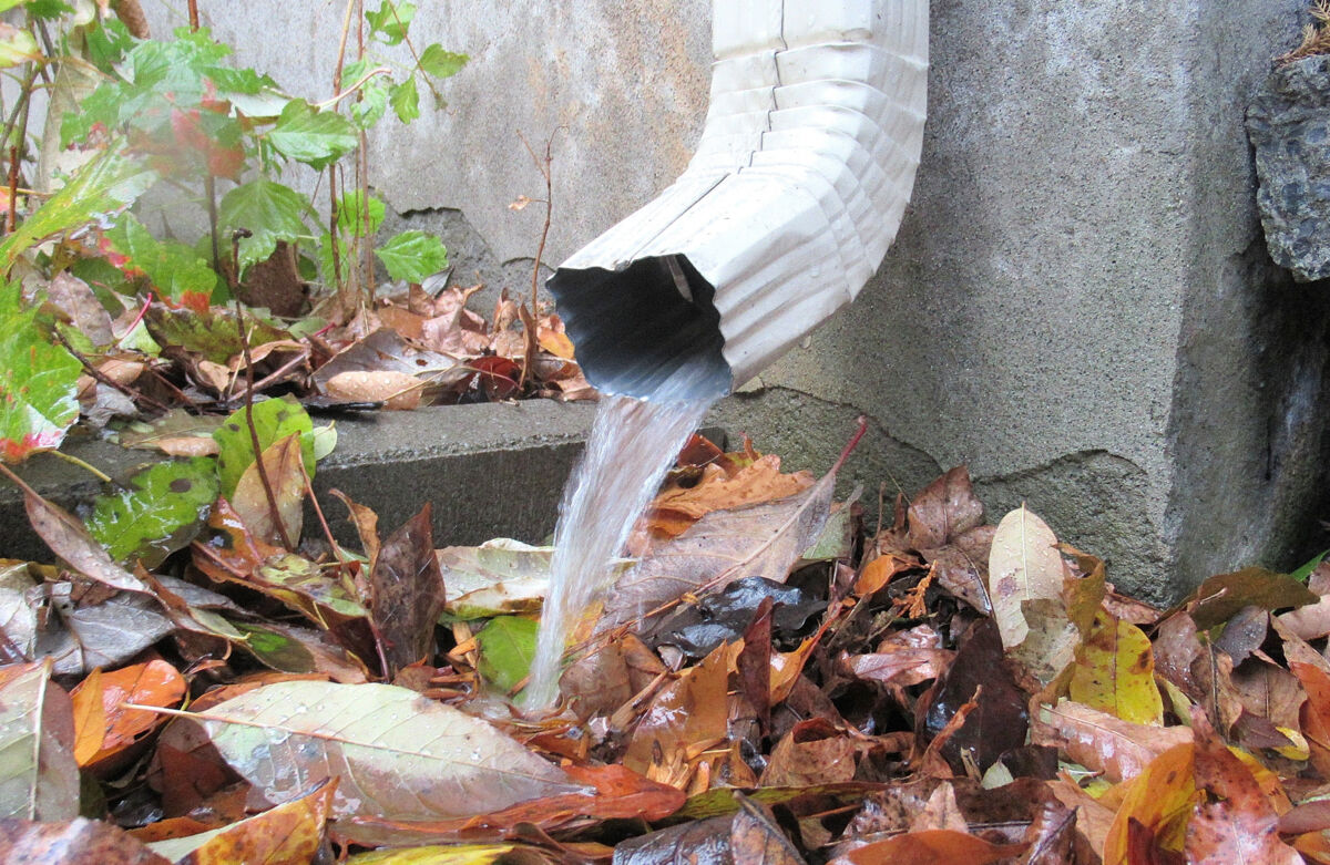 Gutter Pouring Out Water