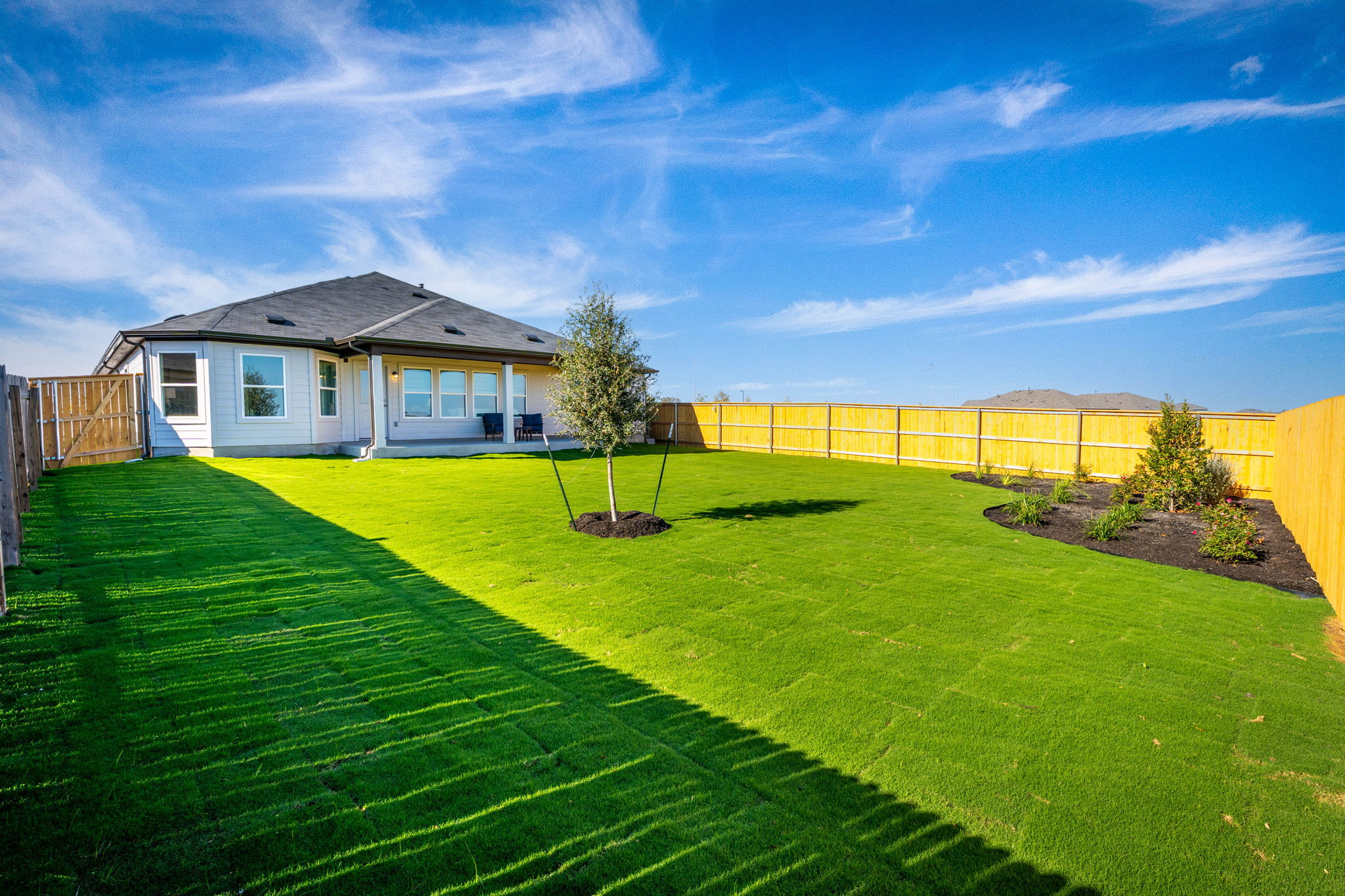 This is the back exterior of the Hawkins plan and is the model home in Carillon at 13305 Eppright...