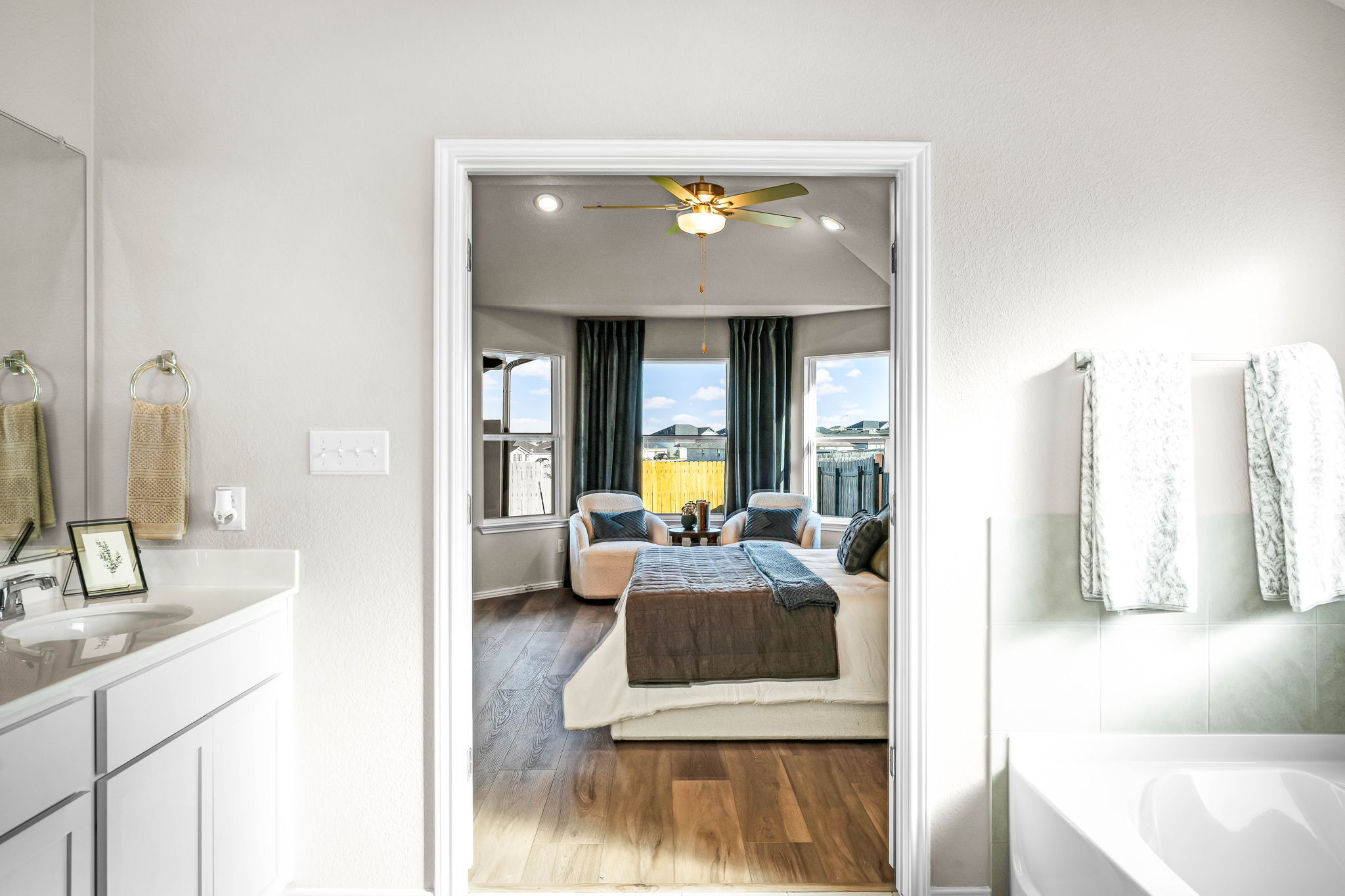 This is the primary bathroom of the Hawkins plan and is the model home in Carillon at 13305 Eppri...
