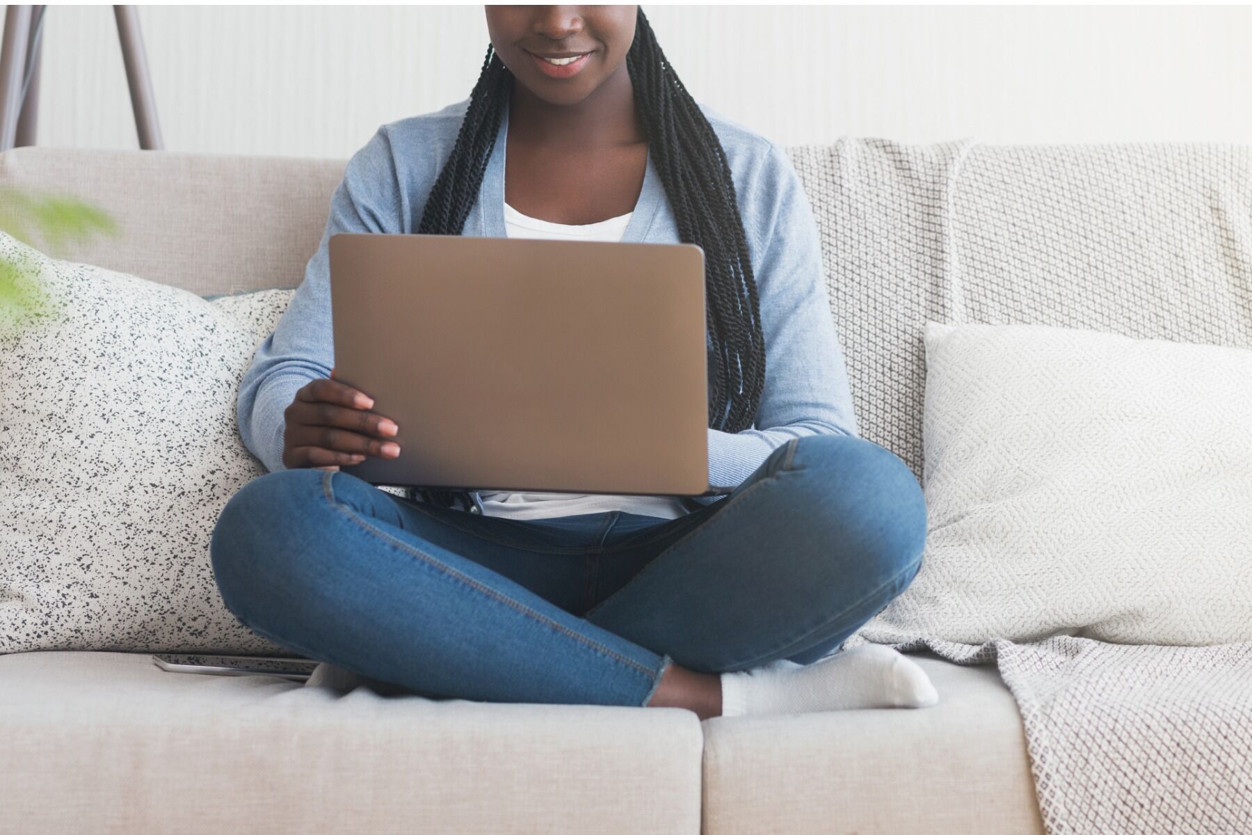 Girl on couch with laptop