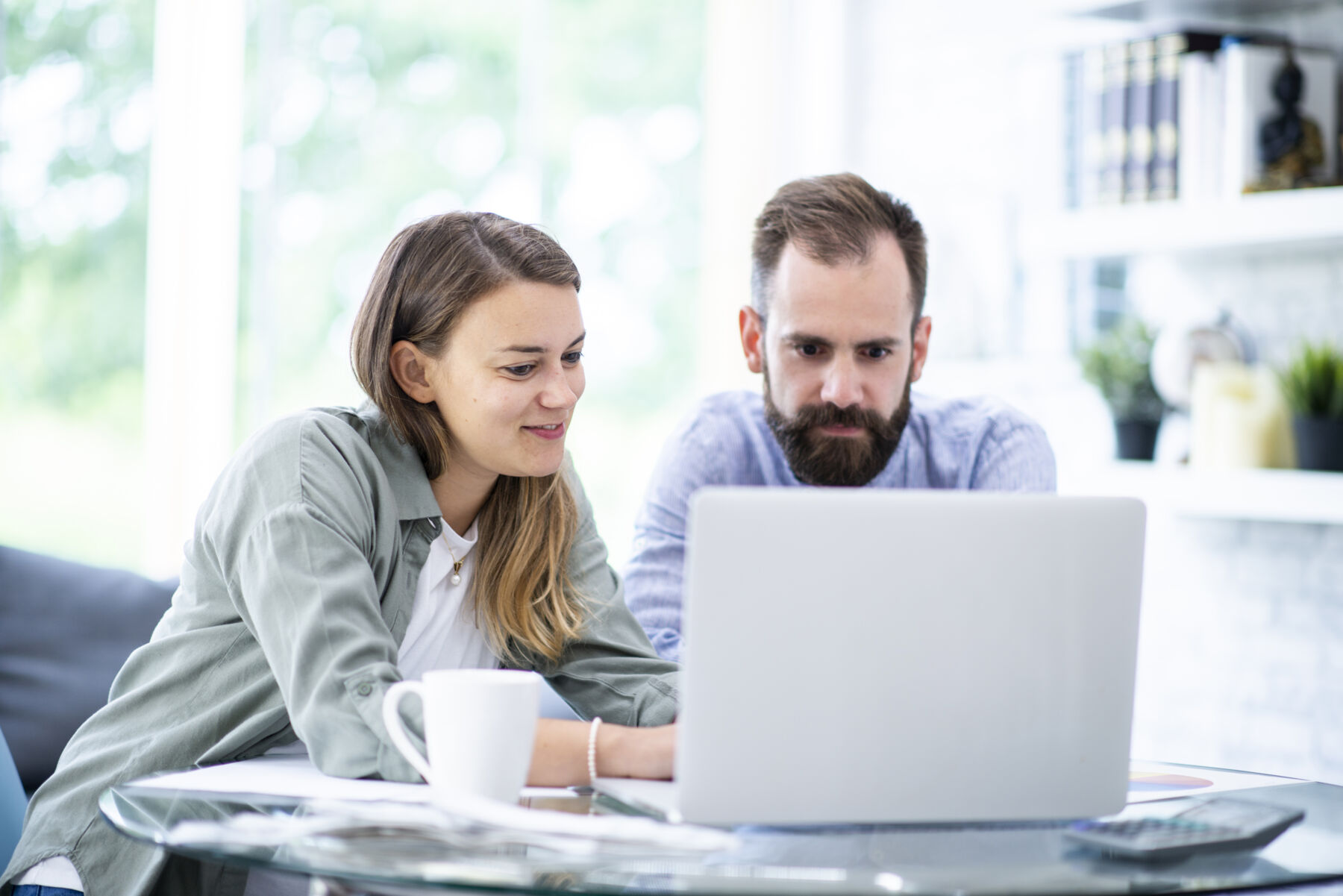 Couple using laptop