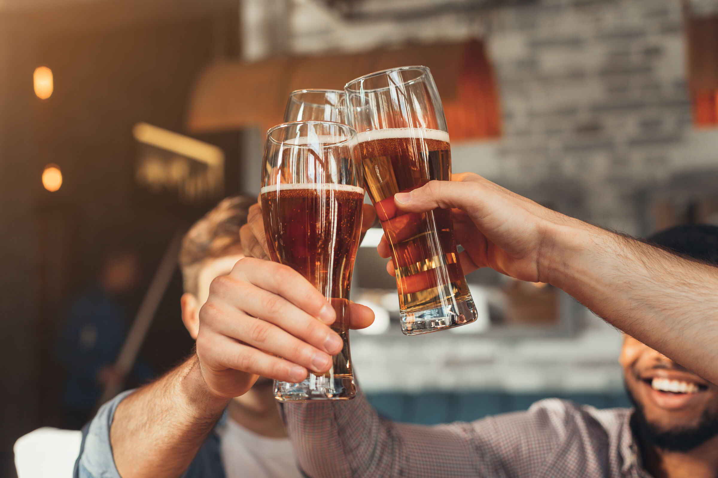 Friends Toasting With Beer