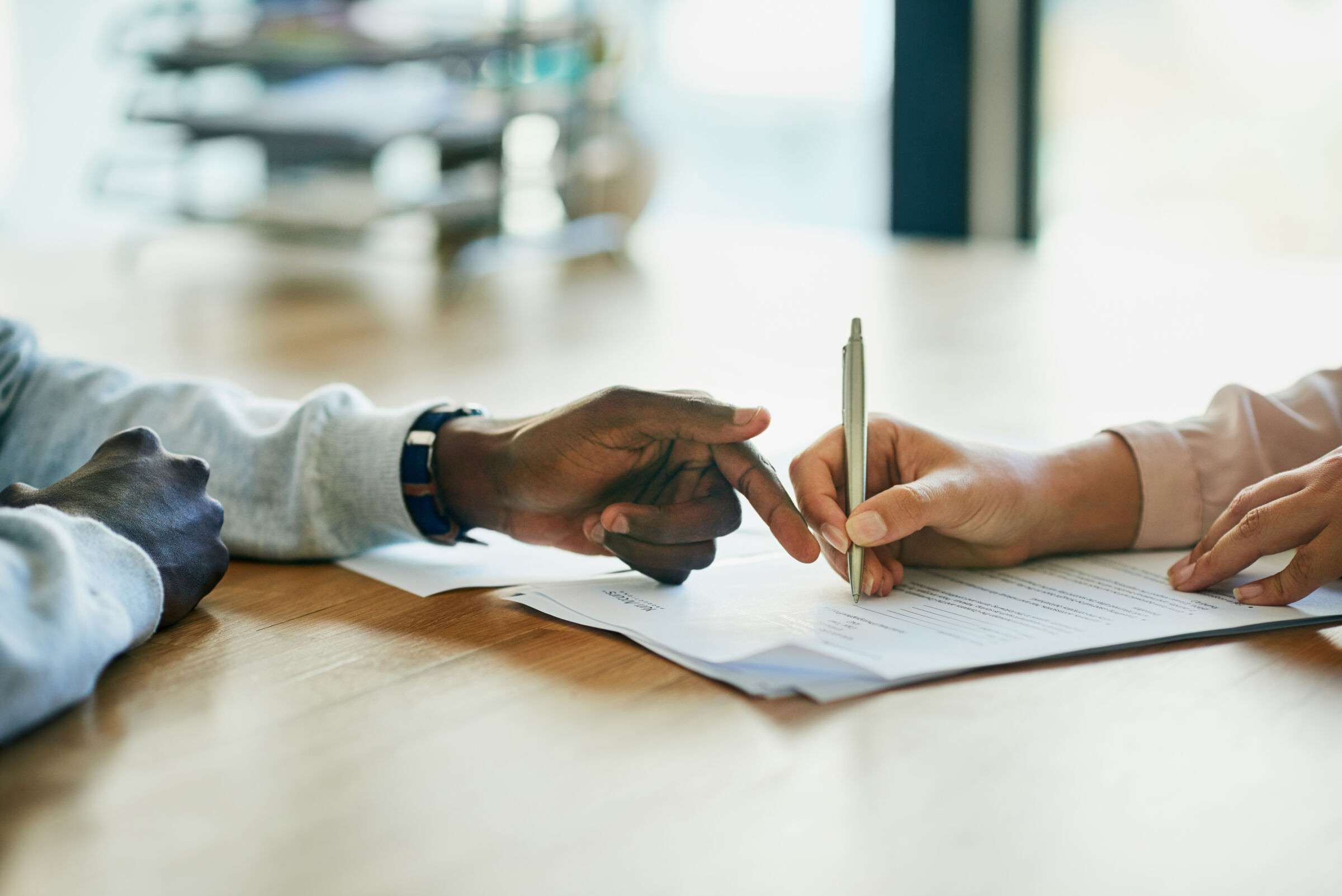 Close-up of a contract signing