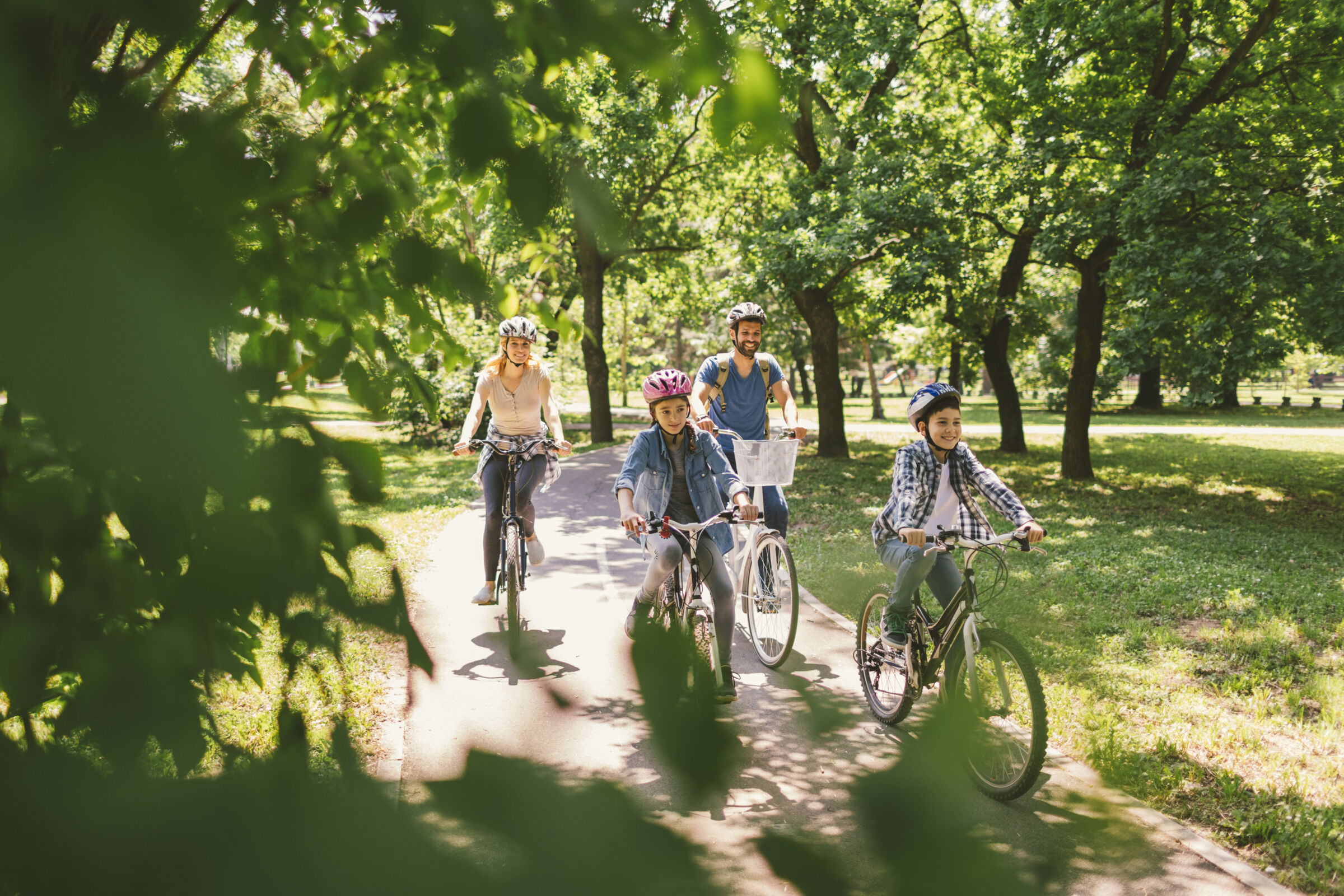 Family of 4 on a bike ride