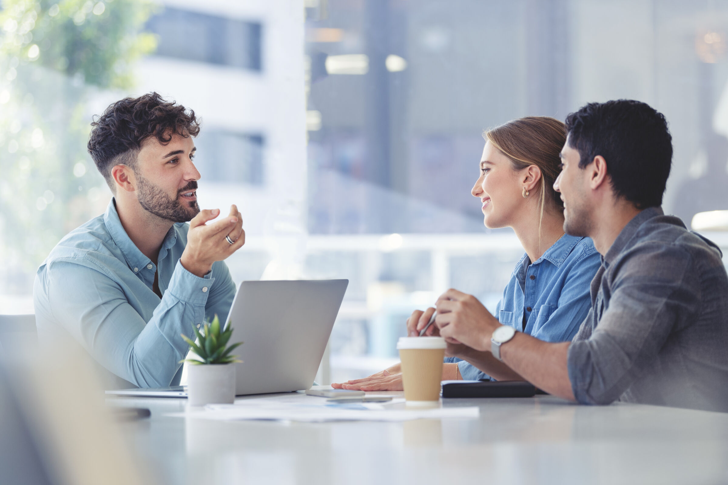 Couple meeting with someone about financing new home