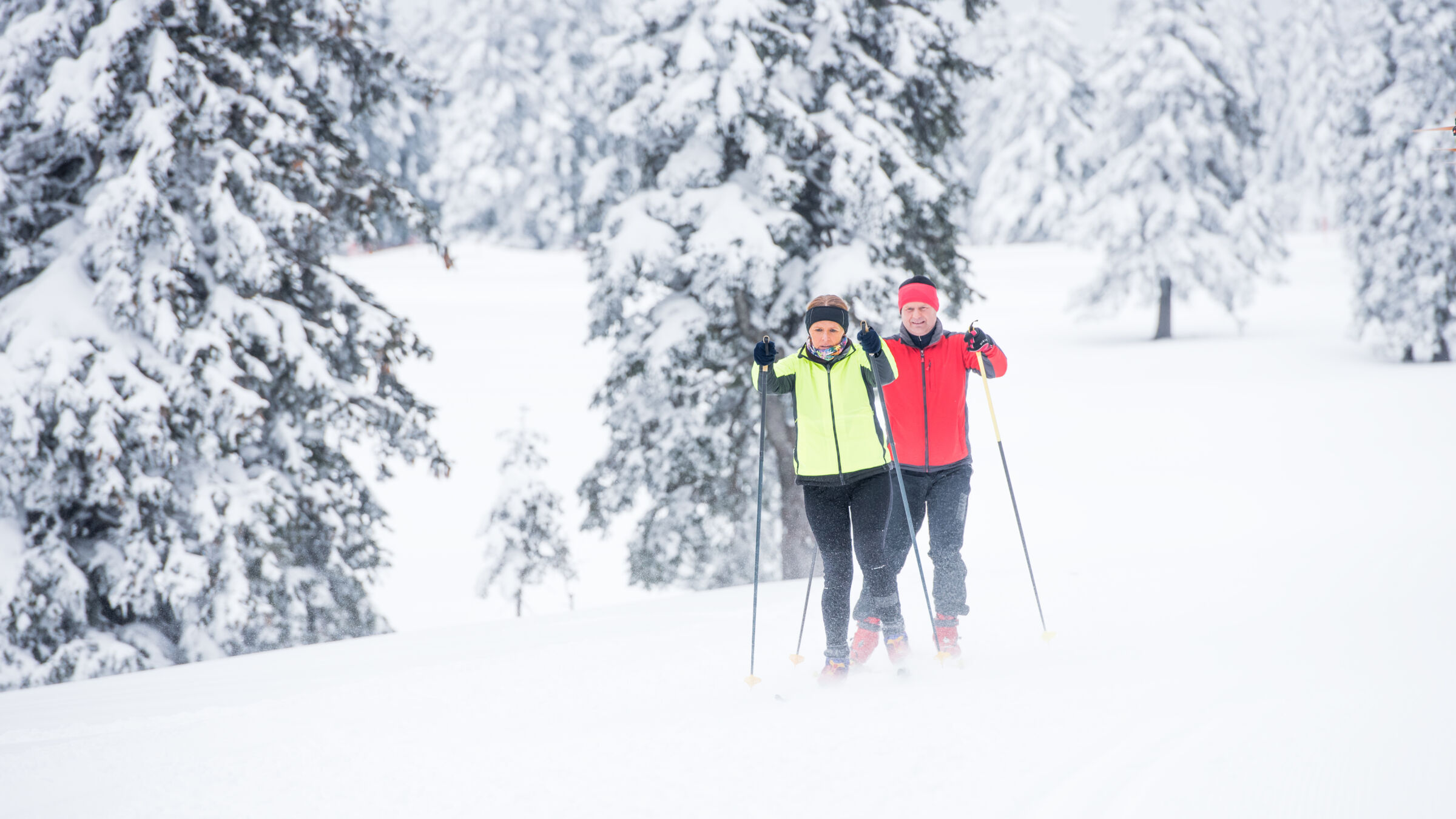 Older couple skiing